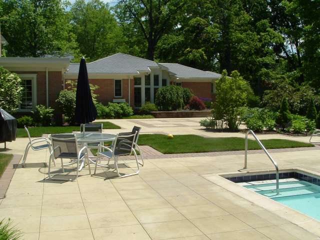 Swimming pool and terrace located in rear of Shaker Heights Ohio Residence.